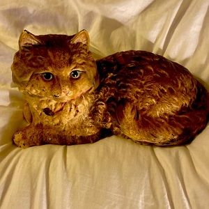 Hubley of Lancaster, PA lounging cat with pink bow cast iron doorstop